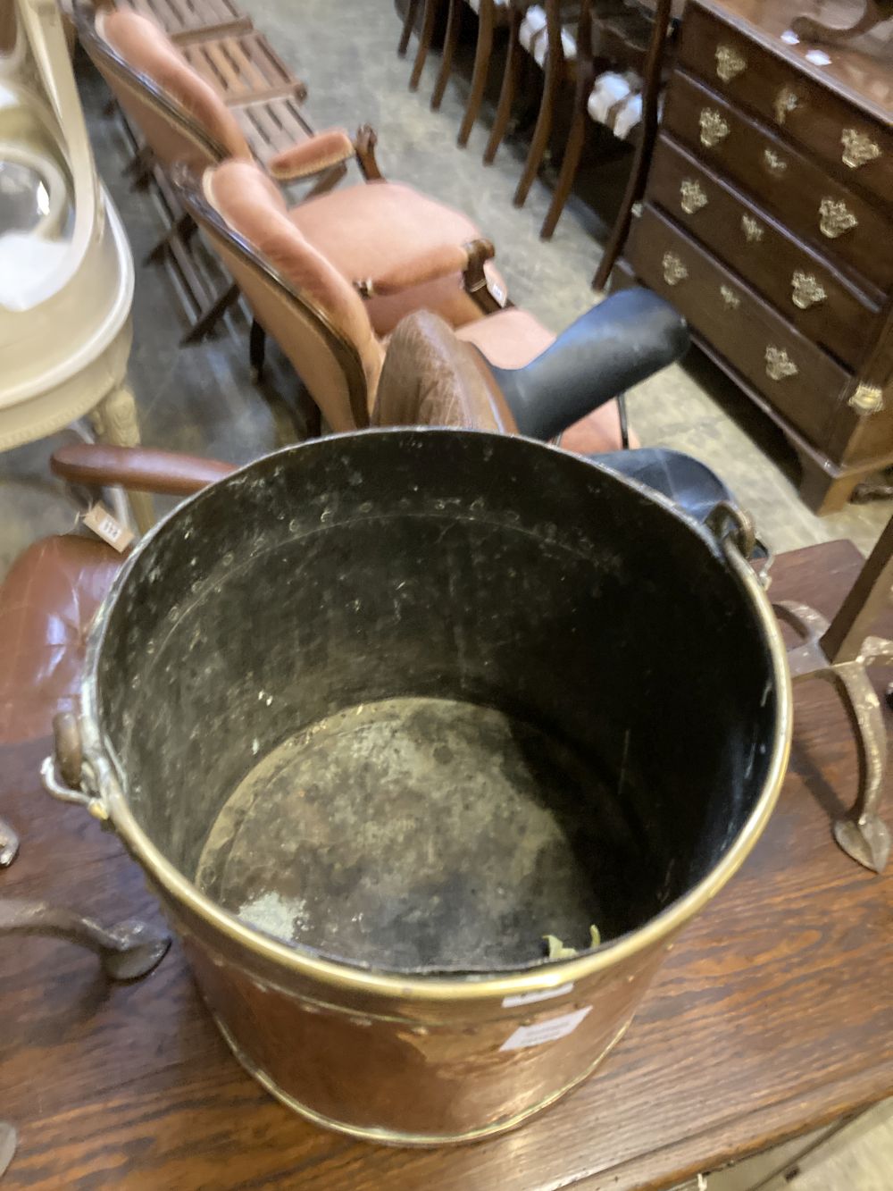 A Victorian copper and brass circular coal bucket, diameter 34cm, together with a pair of brass and wrought iron andirons